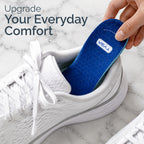Cushioned insole inserted in a white sneaker, showing blue underside with arch support