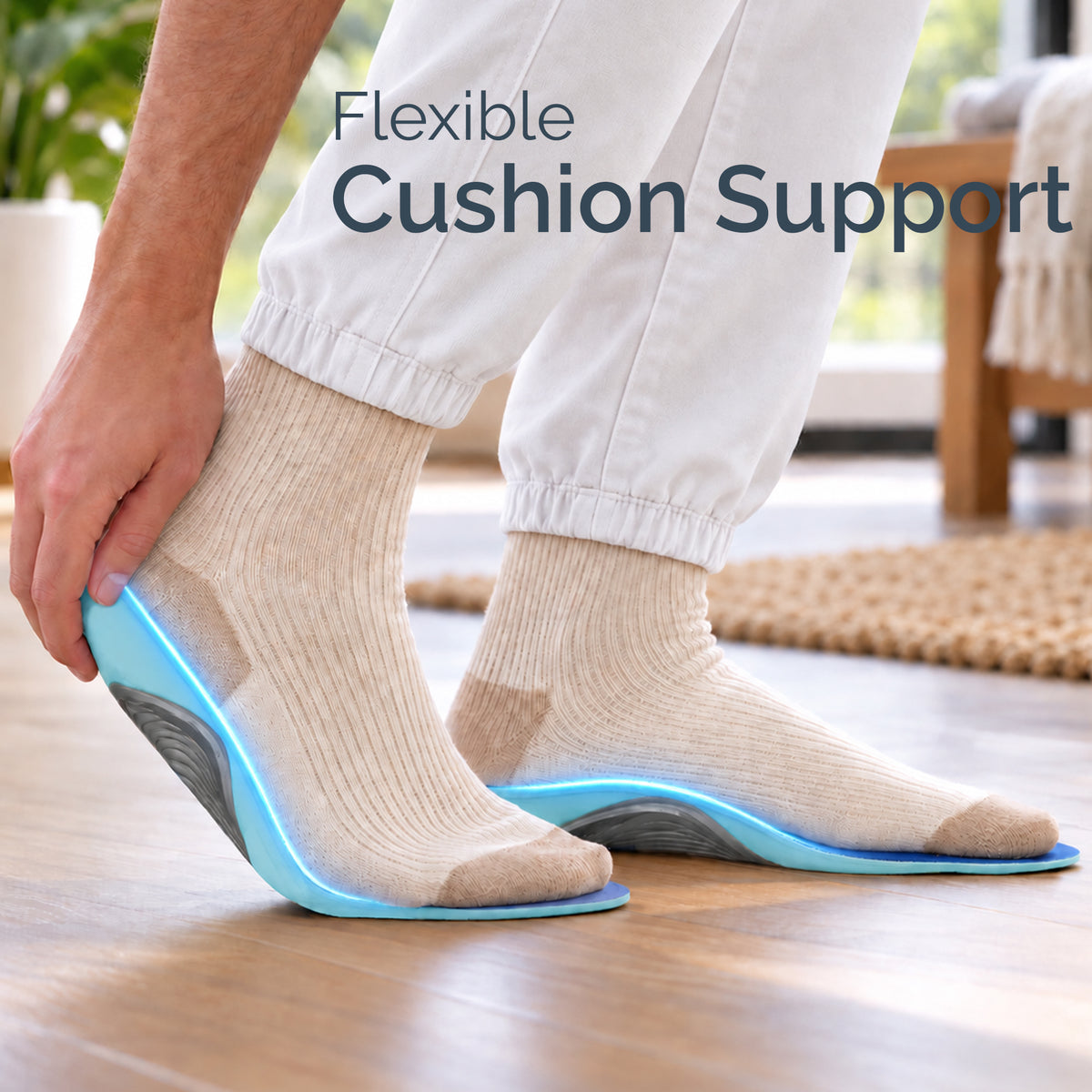 Blue and grey insoles under socked feet with visible cushioned support