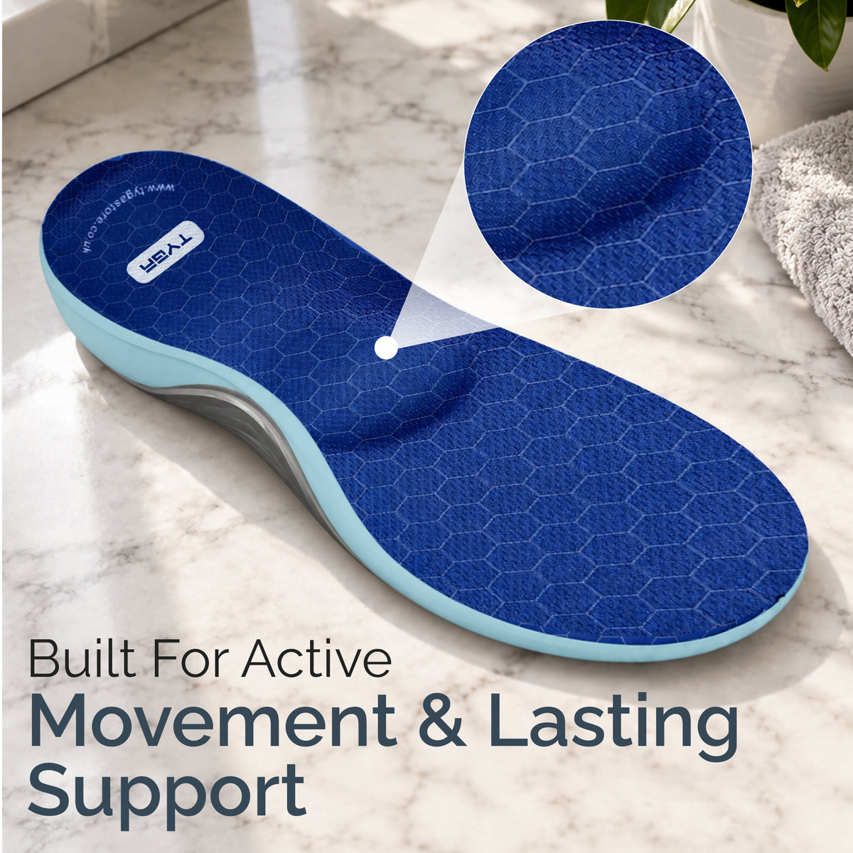 Blue cushioned insole with arch support and heel cup, shown on a sole