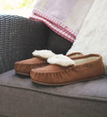 Dark camel moccasin slippers with plush white lining and textured TPR sole