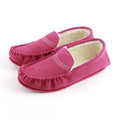 Pink suede moccasin slippers with fleece lining and TPR sole, side view