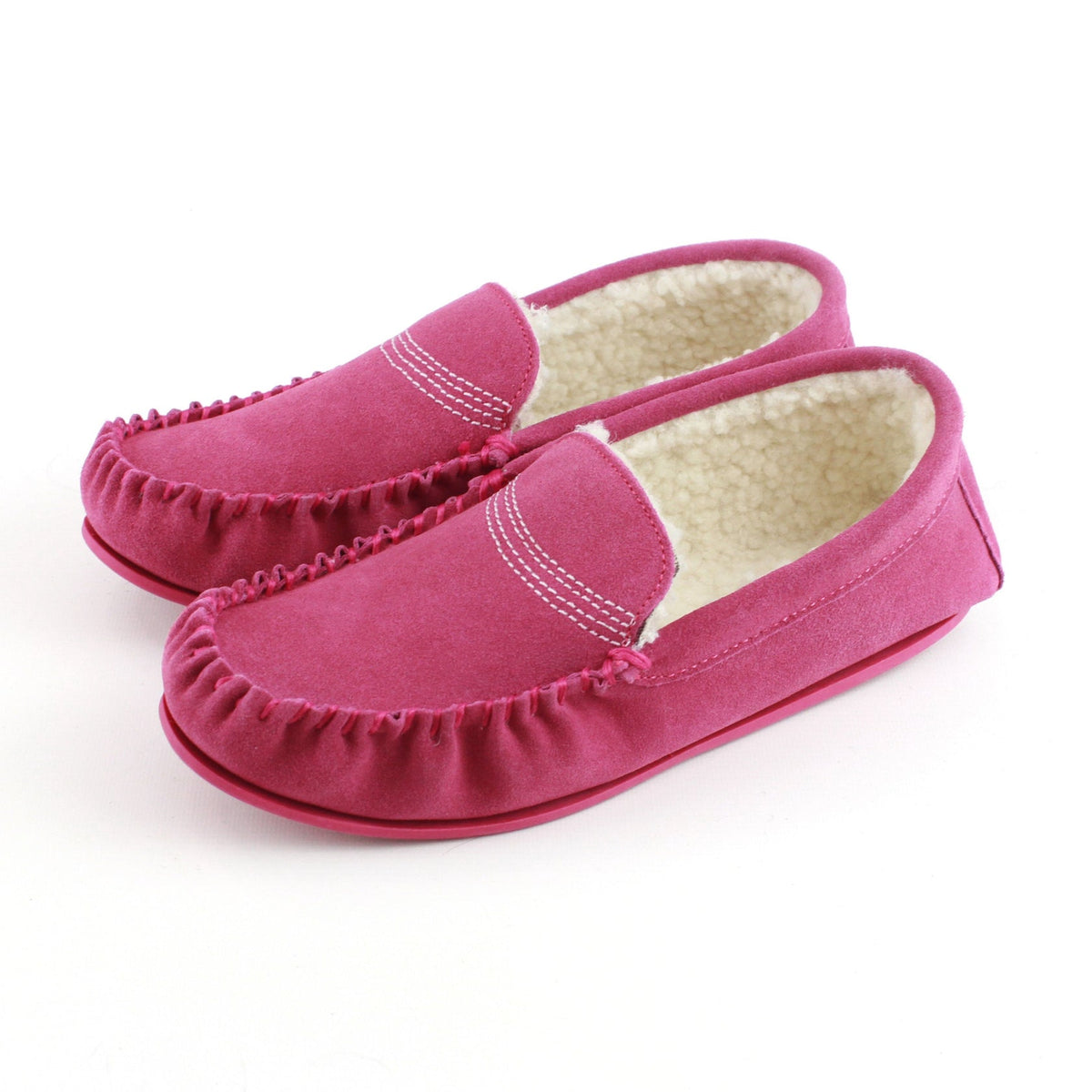 Pink suede moccasin slippers with fleece lining and TPR sole, side view