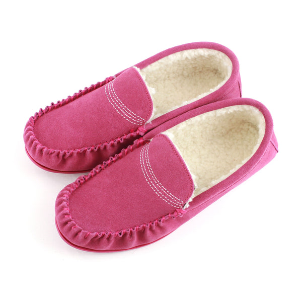 Pink suede moccasin slippers with fleece lining and TPR sole, toe-on angle