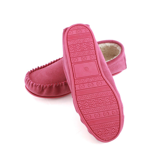Pink suede moccasin slippers with fleece lining and TPR patterned outsole, heel view